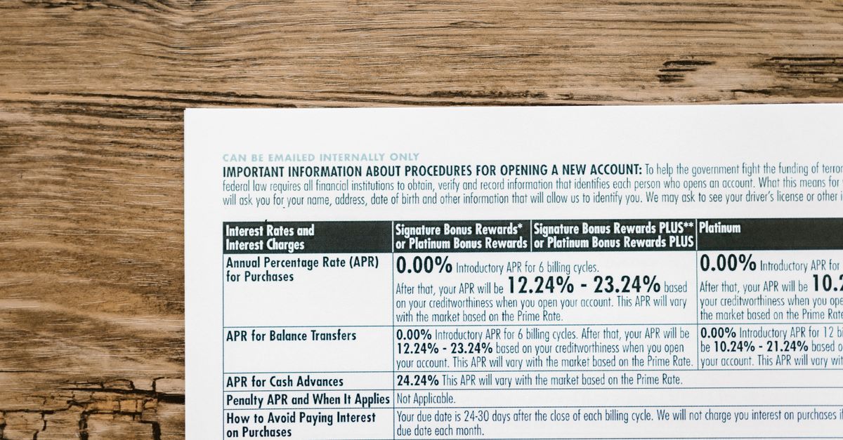 A printed credit card disclosure box listing purchase, balance transfer and cash advance APRs