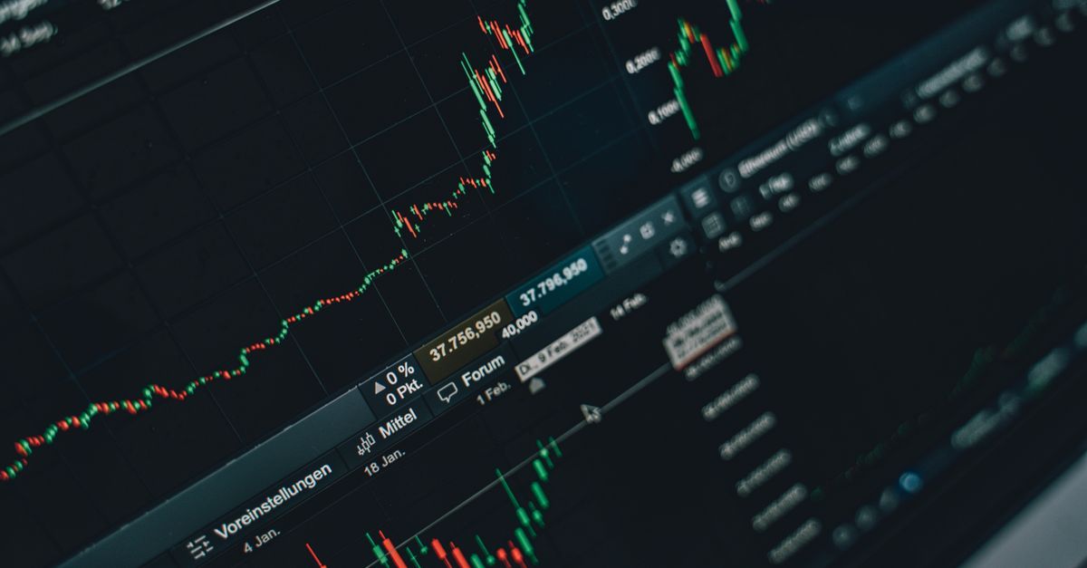 A stock market price chart on a screen